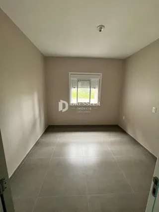 Corredor interno de um imóvel em Lajeado, Brasil.