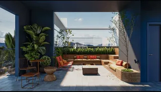 Vista de uma área externa com mobiliário de jardim e vista para a paisagem.