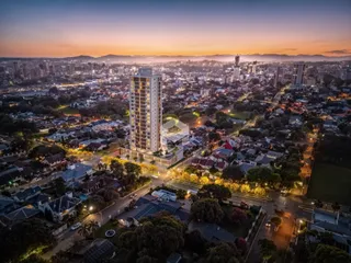 Vista aérea de um bairro residencial em Lajeado, Brasil, ao pôr do sol.