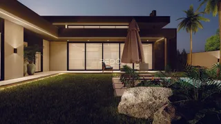 Fachada moderna de uma residência com jardim e área externa em Lajeado, Brasil.