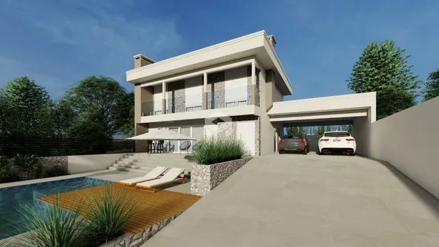 Fachada de uma casa moderna com piscina no exterior.