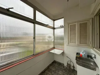 Vista da janela de uma residência em Lajeado, Brasil com vista para um campo.