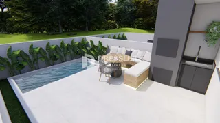 Área externa com piscina e jardim em Lajeado.