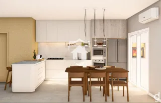 Cozinha moderna com mesa de jantar em um imóvel.