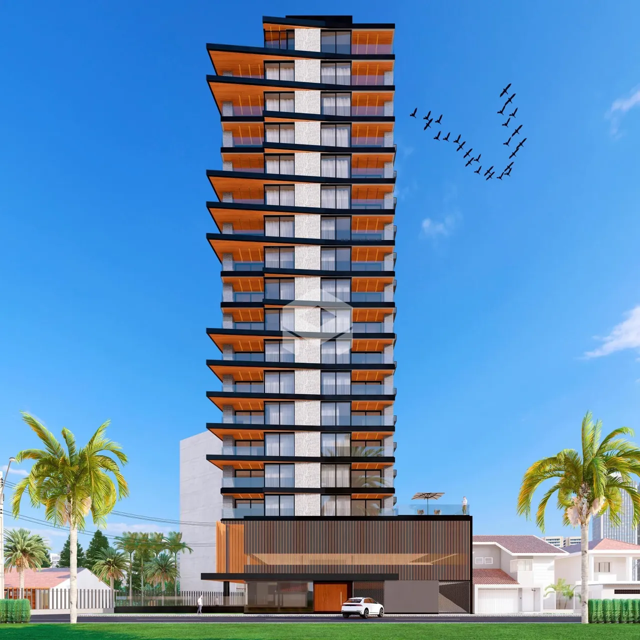 Fachada de um edifício residencial moderno em Lajeado, Brasil, com palmeiras ao redor.