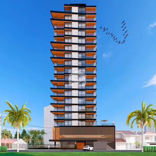 Fachada de um edifício residencial moderno em Lajeado, Brasil, com palmeiras ao redor.