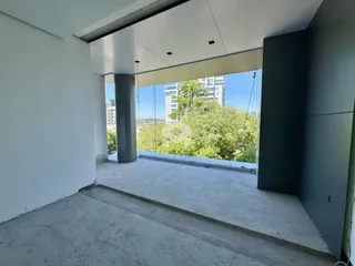 Vista de um espaço aberto com vista para a paisagem verde de Lajeado.