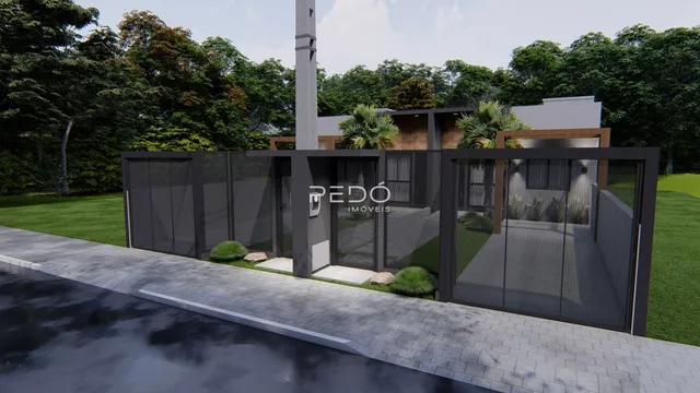 A fachada de uma residência em Lajeado, Brasil, é mostrada com cercas e vegetação.