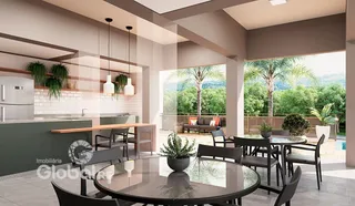 Ambiente moderno de sala de jantar com vista para o jardim.