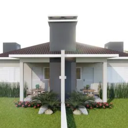 Fachada de uma casa com telhado de telhas vermelhas em Lajeado.