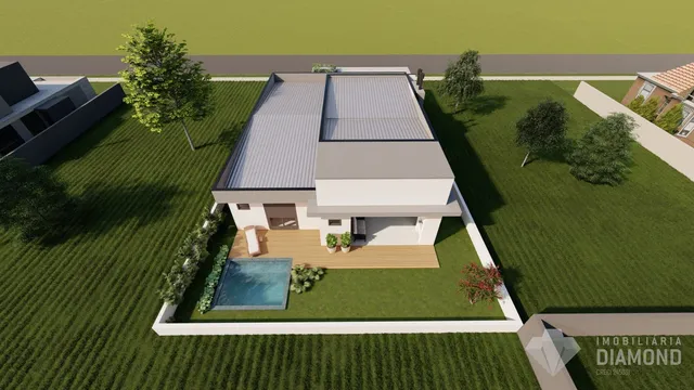 Vista aérea da casa em Lajeado com piscina e jardim.
