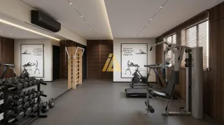 Foto de uma academia interna com equipamentos de musculação e painéis de madeira.