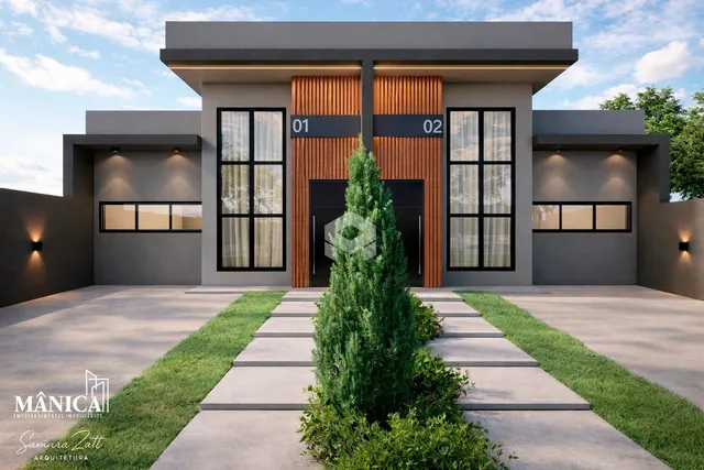Fachada moderna de uma residência em Lajeado com jardim frontal.