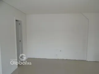 Parede branca de um cômodo em um imóvel em Lajeado, Brasil.