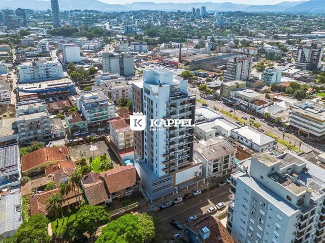 Vista aérea de uma área urbana em Lajeado, mostrando diversos edifícios residenciais.