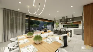 Ambiente de sala de jantar e cozinha com vista para o jardim.