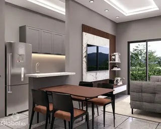 Ambiente moderno com cozinha e sala de jantar em um imóvel.