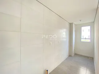 Parede interna branca de uma residência em Lajeado, Brasil.