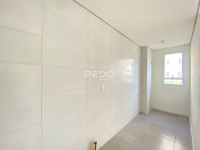 Parede interna branca de uma residência em Lajeado, Brasil.