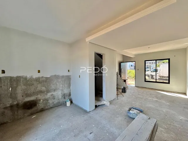 Foto de um cômodo interno de uma propriedade em construção.