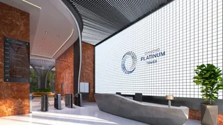 Imagem de um espaço comum moderno com paredes brancas e detalhes arquitetônicos.