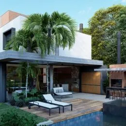 Vista de uma área externa com deck de madeira e piscina em uma residência.