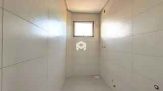 Corredor interno de uma residência em Lajeado, Brasil.