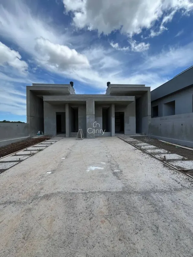Fachada externa de um prédio moderno em Lajeado, Brasil, mostrando a entrada.