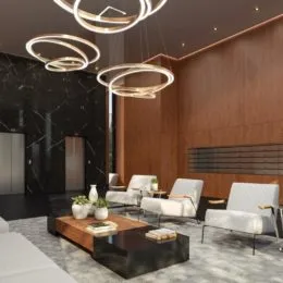 Sala de estar moderna com luminária circular e decoração contemporânea.