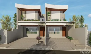 Fachada moderna de uma casa em Lajeado, Brasil, com dois andares e varandas.
