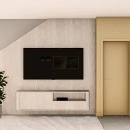 Foto de uma parede com televisão e armário em uma sala.
