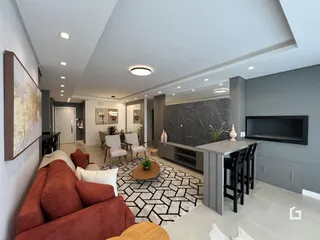 Sala de estar moderna com sofá e decoração em um apartamento em Lajeado.