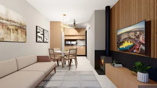 Sala de estar com sofá e mesa de jantar em um apartamento.