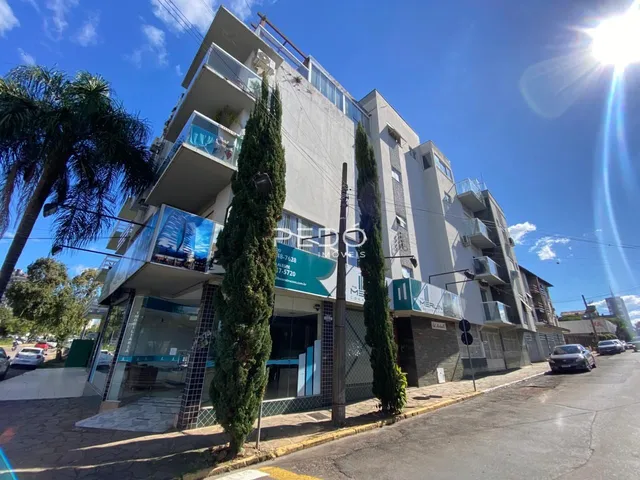 Fachada de um prédio residencial em Lajeado, Brasil, com varandas.