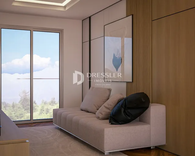 Sala de estar com grande janela de vidro e vista para a paisagem.