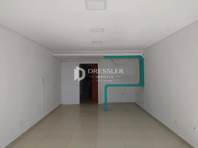 Hall de entrada com piso de cerâmica em uma propriedade em Lajeado.