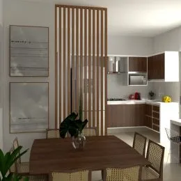 Foto de uma sala de jantar com painéis de madeira e área de cozinha ao fundo.