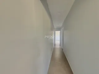 Corredor interno de um imóvel em Lajeado, Brasil.