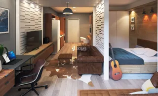 Sala de estar moderna com piso de madeira e móveis de couro.
