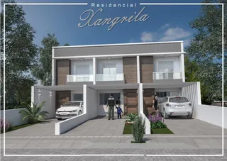 Fachada de uma casa residencial moderna com varanda em Lajeado, Brasil.
