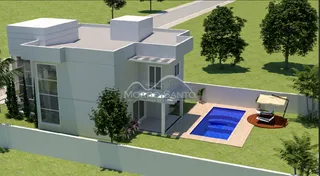 Fachada moderna de uma casa em Lajeado, Brasil, com jardim frontal.