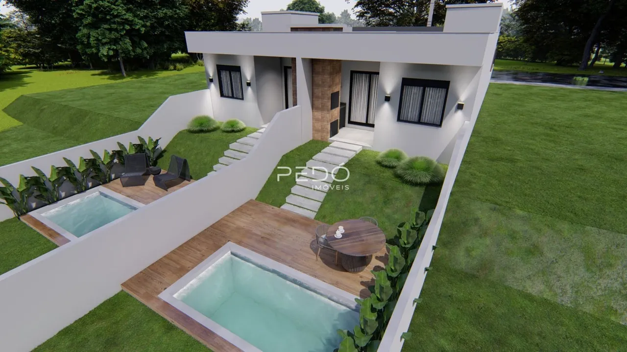 Fachada de uma casa moderna com jardim e piscina em Lajeado.