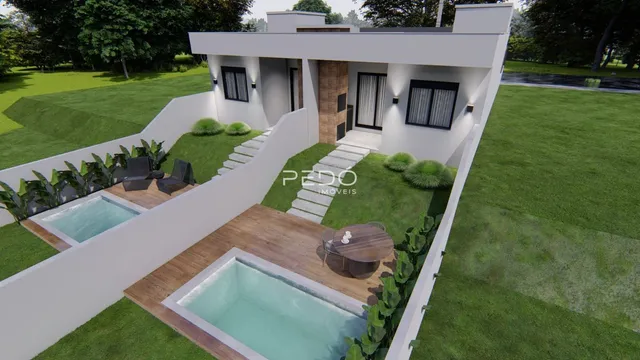 Fachada de uma casa moderna com jardim e piscina em Lajeado.