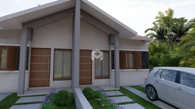 A fachada de uma casa moderna em Lajeado, Brasil com jardim.