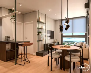Ambiente moderno com sala de jantar e cozinha em um imóvel no Brasil.