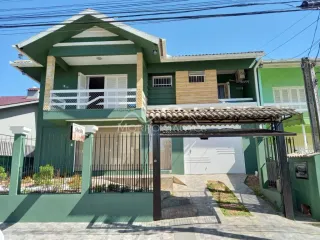 Casa com 4 dormitórios, foto 1