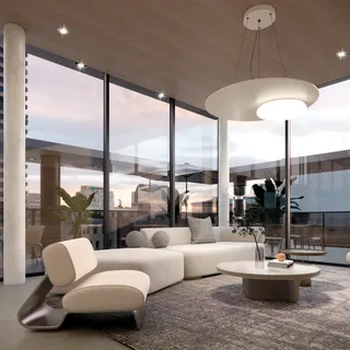 Sala de estar moderna com grandes janelas e decoração contemporânea.