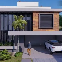 Fachada externa de uma residência com revestimento de tijolos e painéis escuros.