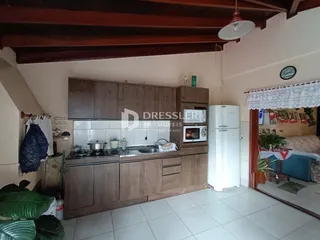 Vista da cozinha e área de jantar de um imóvel em Lajeado, Brasil.