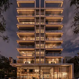 Fachada moderna de um prédio residencial em Lajeado, Brasil com múltiplos andares e varandas.